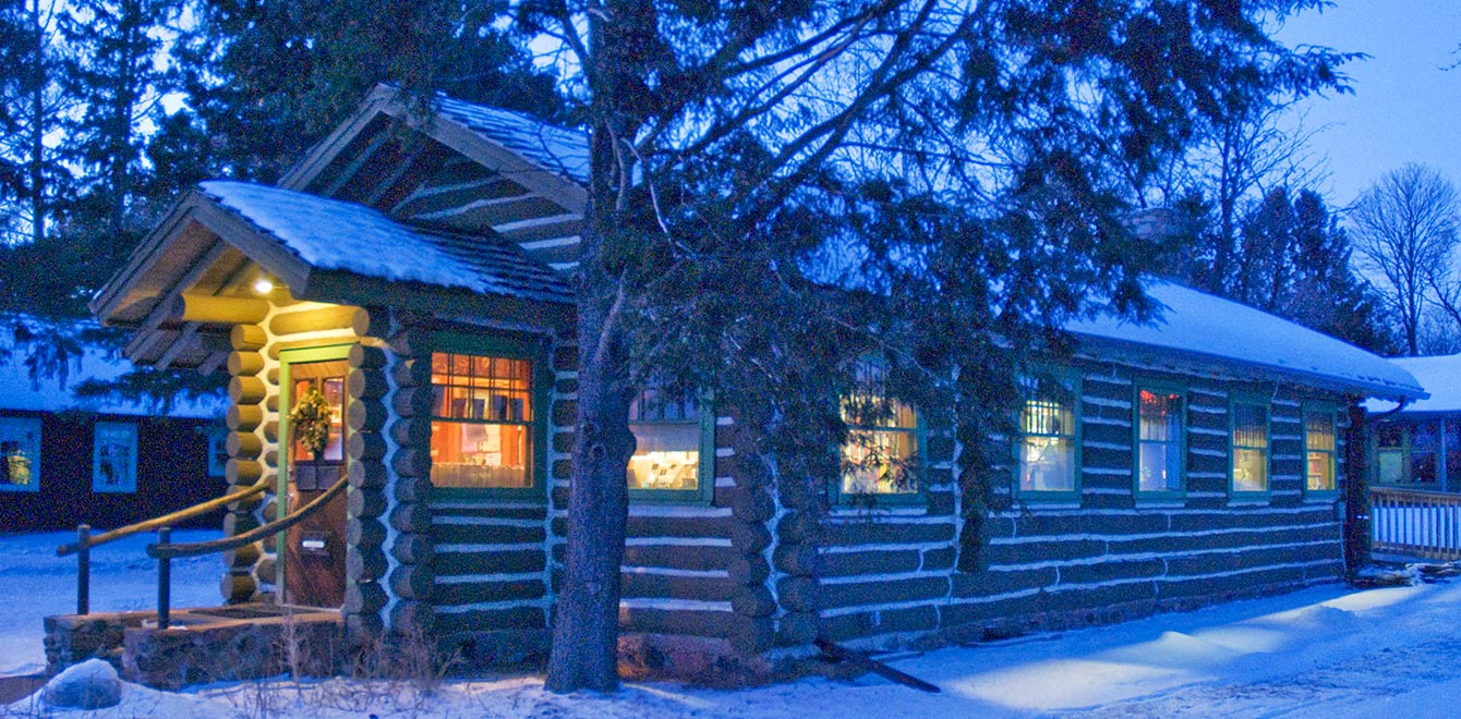 A twilight winter view of The Forest Lodge Library in Cable, Wisconsin.